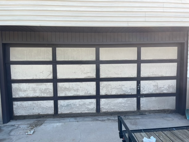 Old garage door in need of repair