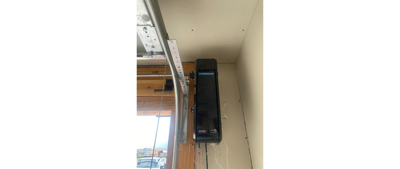 Outdated garage door Kaysville Utah - opener being upgraded